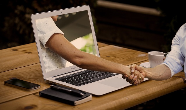 Online trust handshake through laptop