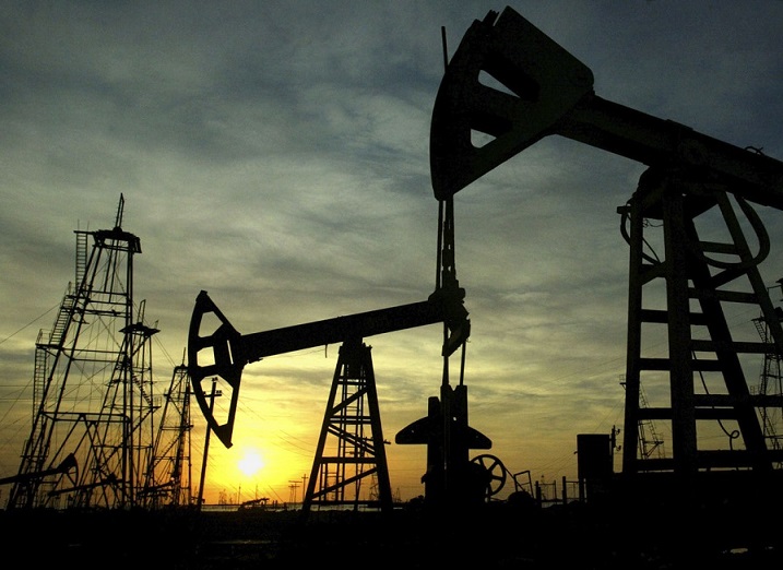 Oil field at dusk