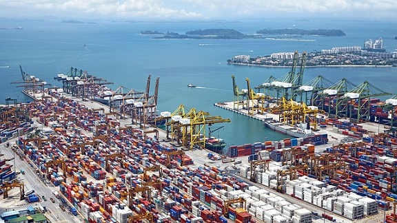 Sea port with many containers and cranes