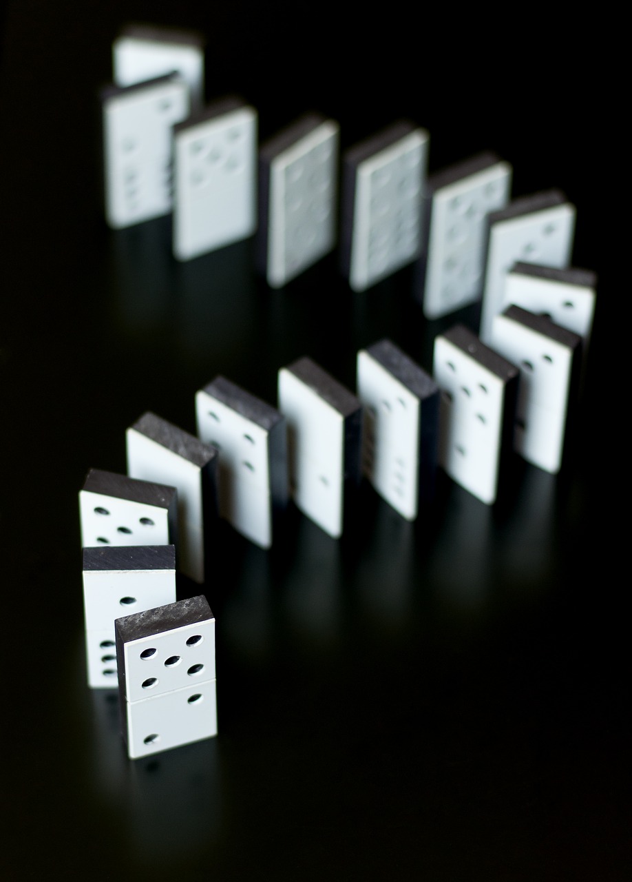 White dominoes black background